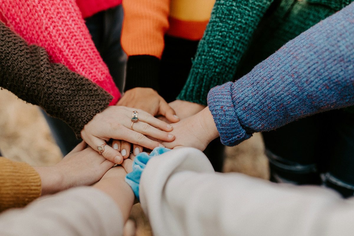 Picture of Group praying in the page Resources for small groups