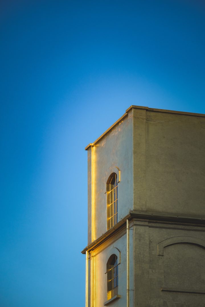 Picture of Vertical shot temple building background blue sky in the page Mission, identity and the work already underway